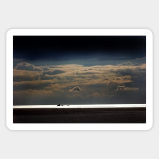 Sealight - clouds over The Wash as a ship moves along the coast near Hunstanton, Norfolk Sticker
